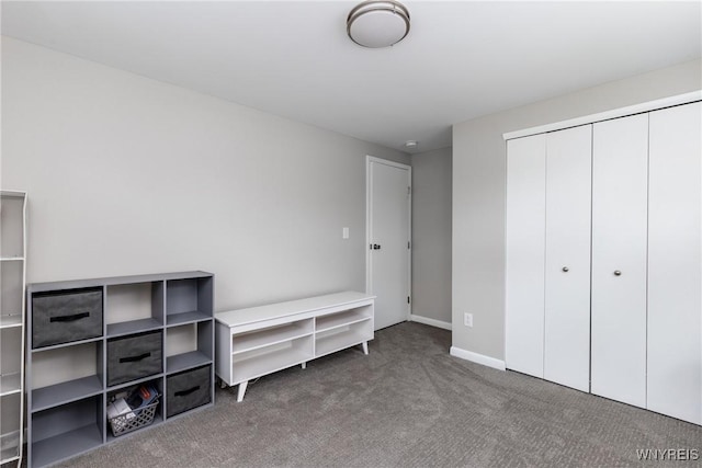 195 Robert Dr, North Tonawanda, NY 14120 - unfurnished bedroom featuring carpet flooring, a closet, and baseboards