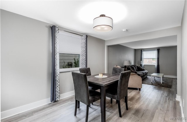 195 Robert Dr, North Tonawanda, NY 14120 - dining space with light wood-style flooring and baseboards