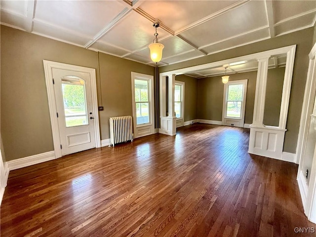 140 Maple St, Le Ray, NY 13612 - unfurnished room with radiator, healthy amount of natural light, decorative columns, and coffered ceiling