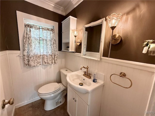 140 Maple St, Le Ray, NY 13612 - half bath with vanity, a wainscoted wall, ornamental molding, and toilet