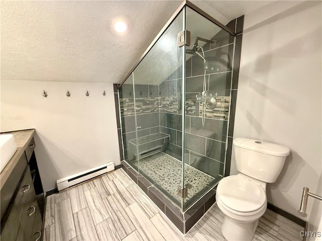 140 Maple St, Le Ray, NY 13612 - bathroom featuring a baseboard heating unit, toilet, vanity, a shower stall, and a textured ceiling