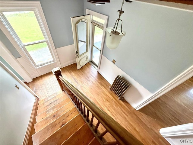 140 Maple St, Le Ray, NY 13612 - staircase with wood finished floors and baseboards