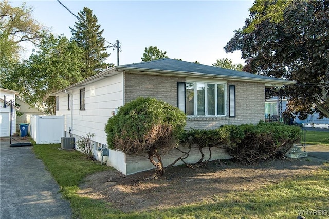 2923 N Ave, Niagara Falls, NY 14305 - view of home's exterior with central air condition unit and brick siding