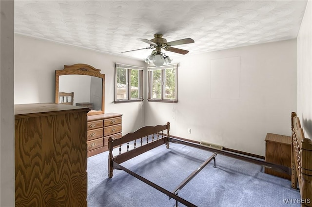 2923 N Ave, Niagara Falls, NY 14305 - bedroom featuring ceiling fan, a textured ceiling, baseboards, and carpet floors