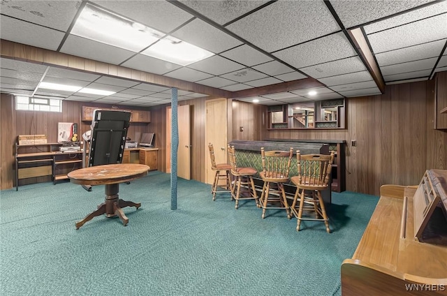 2923 N Ave, Niagara Falls, NY 14305 - rec room featuring a bar, carpet, wood walls, and a paneled ceiling