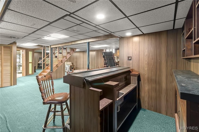 2923 N Ave, Niagara Falls, NY 14305 - indoor dry bar featuring carpet flooring, stairs, a paneled ceiling, and wooden walls