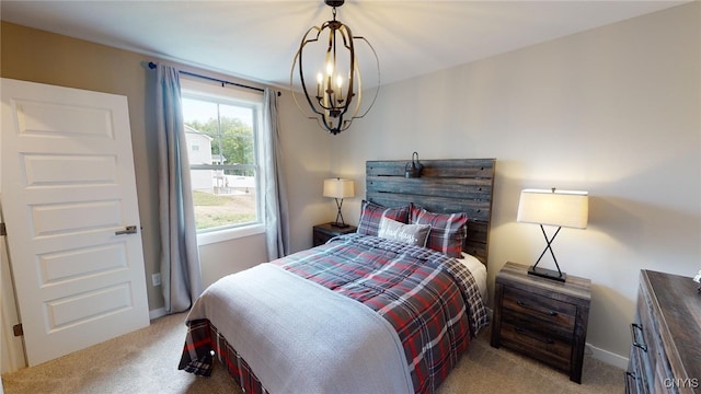 213 Lexi Ln, Van Buren, NY 13027 - carpeted bedroom featuring a chandelier and baseboards