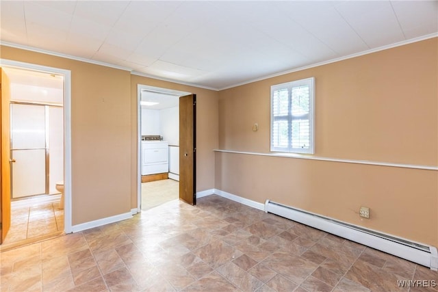 24 Glenbourne Ct, Amherst, NY 14221 - unfurnished room with a baseboard heating unit, washer / clothes dryer, crown molding, and baseboards