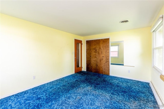 24 Glenbourne Ct, Amherst, NY 14221 - carpeted empty room with baseboards