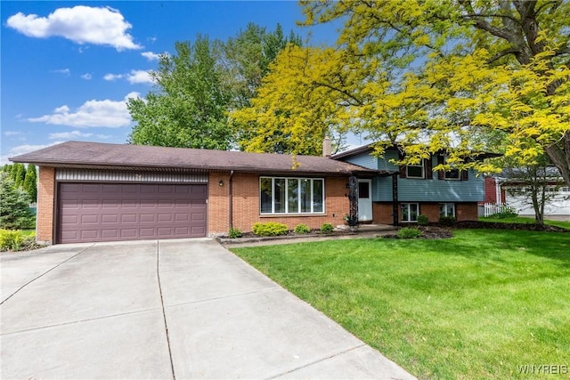 24 Glenbourne Ct, Amherst, NY 14221 - tri-level home with concrete driveway, brick siding, an attached garage, and a front lawn