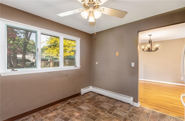 24 Glenbourne Ct, Amherst, NY 14221 - unfurnished room featuring a baseboard heating unit, plenty of natural light, and baseboards