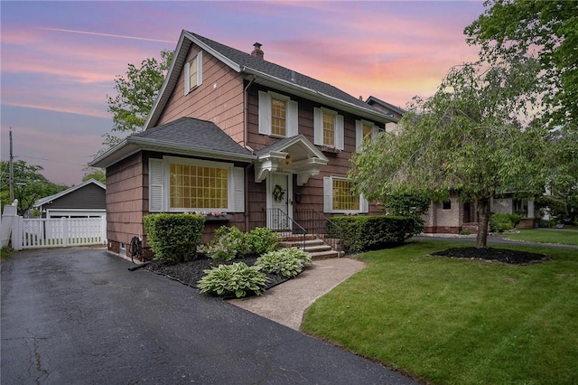 196 Elmcroft Rd, Rochester, NY 14609 - view of front of home featuring a shingled roof, a garage, an outbuilding, and a chimney