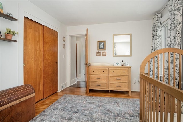 196 Elmcroft Rd, Rochester, NY 14609 - bedroom featuring dark wood finished floors and a closet