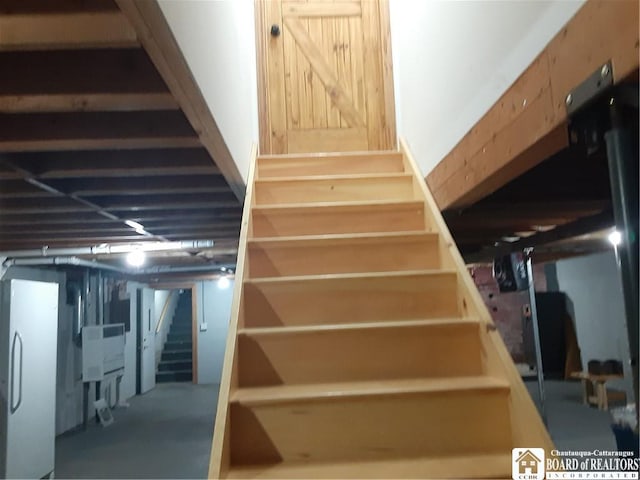 9165 Hebner Hill Rd, Otto, NY 14719 - staircase with concrete floors