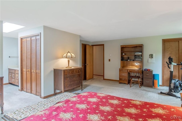 8974 Fenner Rd, Lysander, NY 13027 - bedroom with carpet flooring, a skylight, and baseboards
