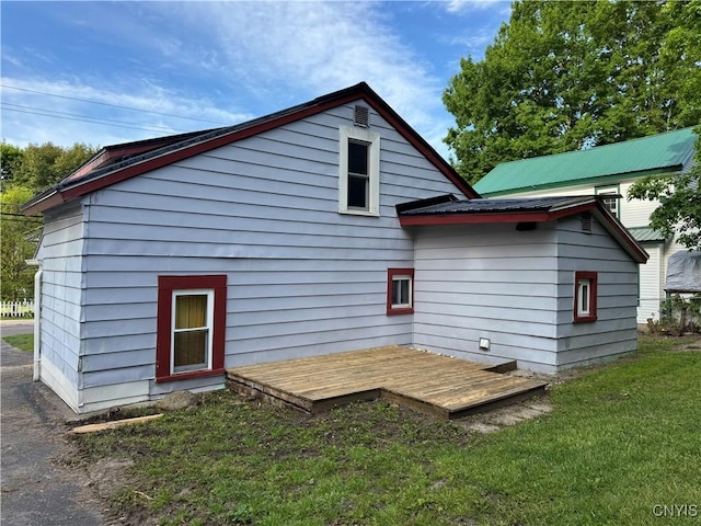 725 Emery St, Fulton, NY 13069 - back of house featuring a yard