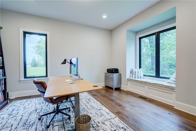 101 Coventry Rdg, Pittsford, NY 14534 - home office featuring plenty of natural light, dark wood-style floors, baseboards, and recessed lighting