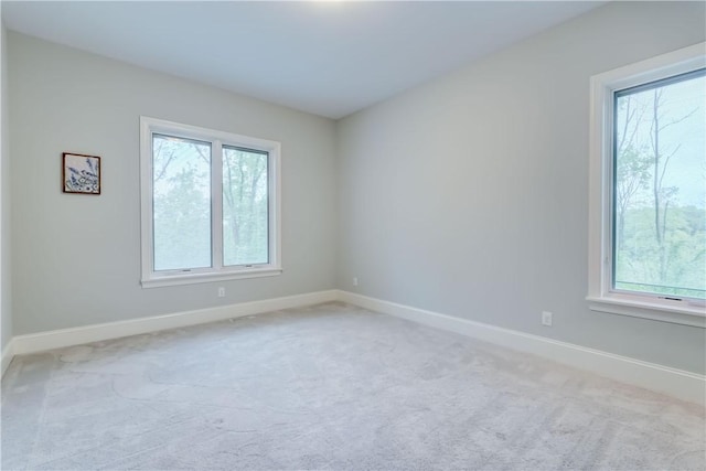 101 Coventry Rdg, Pittsford, NY 14534 - carpeted empty room featuring baseboards