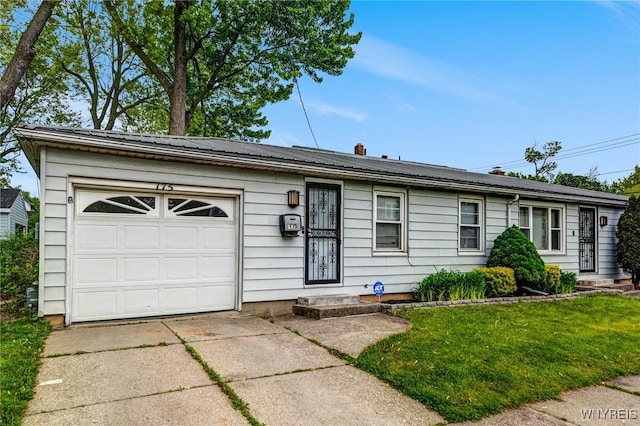 892 Northland Ave, Buffalo, NY 14215 - ranch-style house featuring driveway, a garage, and a front yard