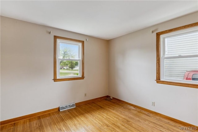 75 Greenmeadow Dr, West Seneca, NY 14224 - unfurnished room featuring baseboards and light wood-style flooring