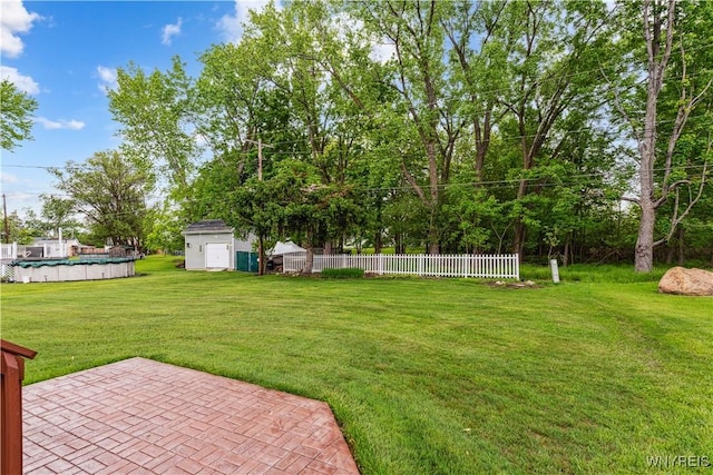 75 Greenmeadow Dr, West Seneca, NY 14224 - view of yard featuring an outdoor pool and a patio area