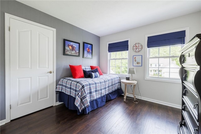 1156 Channing Woods Dr, Webster, NY 14580 - bedroom featuring dark wood-style flooring and baseboards