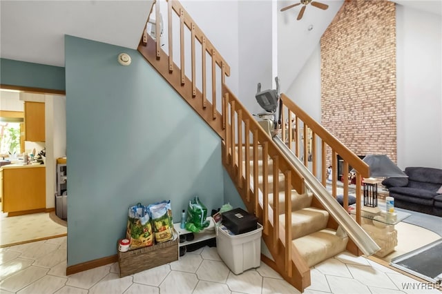 113 Meadow Spring Ln, Amherst, NY 14051 - stairs featuring a ceiling fan and high vaulted ceiling