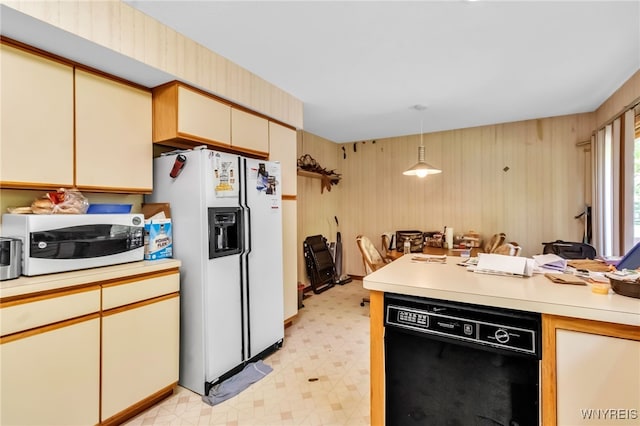 113 Meadow Spring Ln, Amherst, NY 14051 - kitchen featuring white appliances, light floors, light countertops, decorative light fixtures, and cream cabinetry