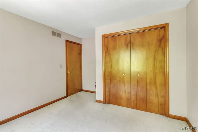 113 Meadow Spring Ln, Amherst, NY 14051 - unfurnished bedroom featuring carpet floors, baseboards, and a closet