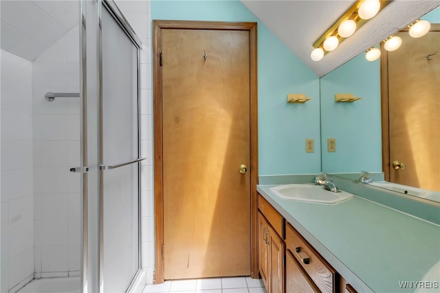 113 Meadow Spring Ln, Amherst, NY 14051 - bathroom featuring a stall shower, vanity, lofted ceiling, and tile patterned floors