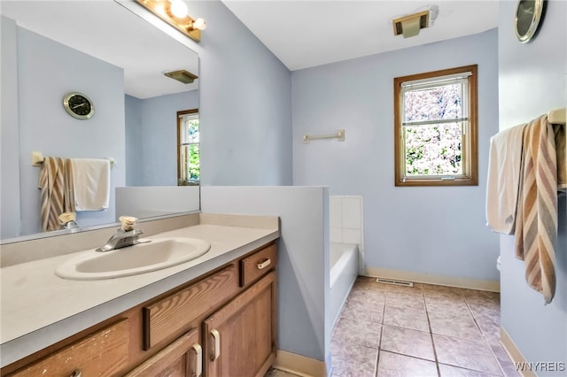 113 Meadow Spring Ln, Amherst, NY 14051 - full bath featuring vanity, a bath, baseboards, tile patterned floors, and toilet