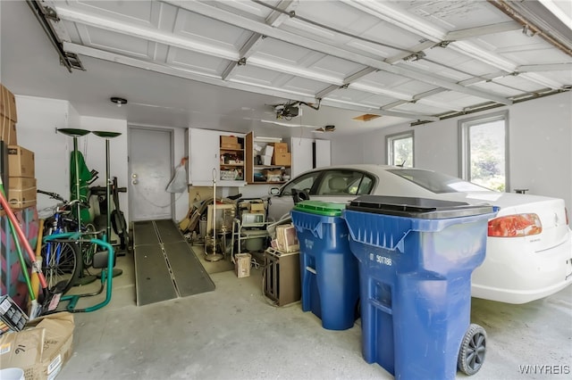 113 Meadow Spring Ln, Amherst, NY 14051 - garage with a garage door opener