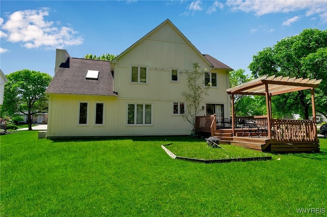 113 Meadow Spring Ln, Amherst, NY 14051 - rear view of property with a wooden deck, a yard, and a shingled roof