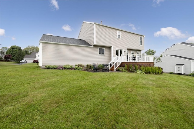 717 Westwood Trl, Walworth, NY 14502 - rear view of house featuring a deck and a yard