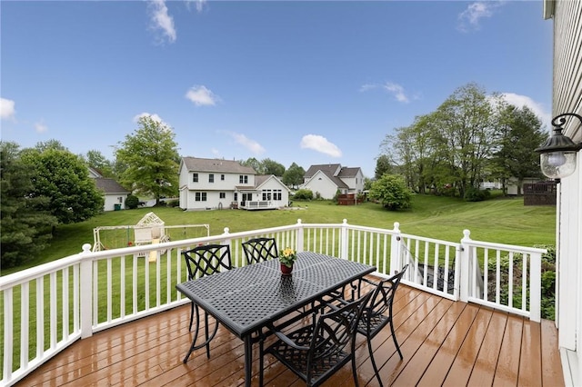 717 Westwood Trl, Walworth, NY 14502 - wooden deck featuring outdoor dining area and a lawn