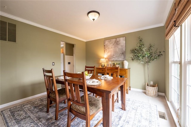 717 Westwood Trl, Walworth, NY 14502 - dining room with crown molding and baseboards