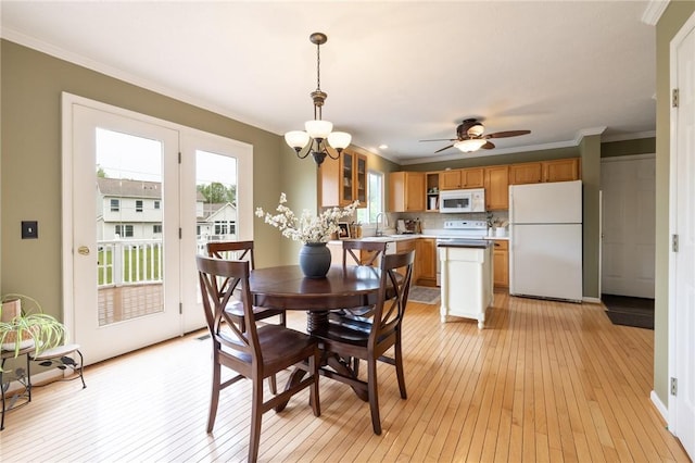 717 Westwood Trl, Walworth, NY 14502 - dining area featuring light wood finished floors, ceiling fan, and ornamental molding