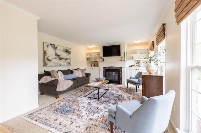 717 Westwood Trl, Walworth, NY 14502 - living room with plenty of natural light, a premium fireplace, baseboards, and crown molding
