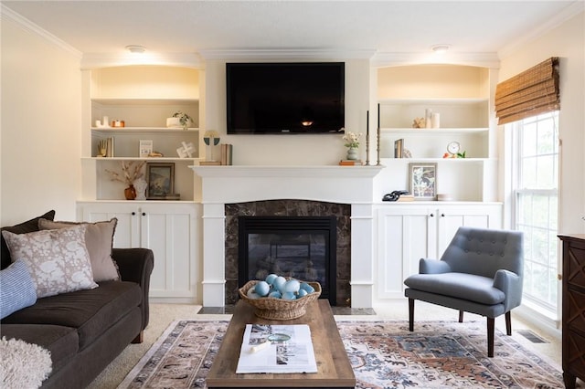 717 Westwood Trl, Walworth, NY 14502 - living area featuring crown molding, a fireplace, and built in features