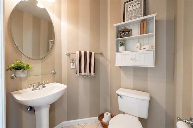 717 Westwood Trl, Walworth, NY 14502 - bathroom featuring toilet, tile patterned flooring, and baseboards