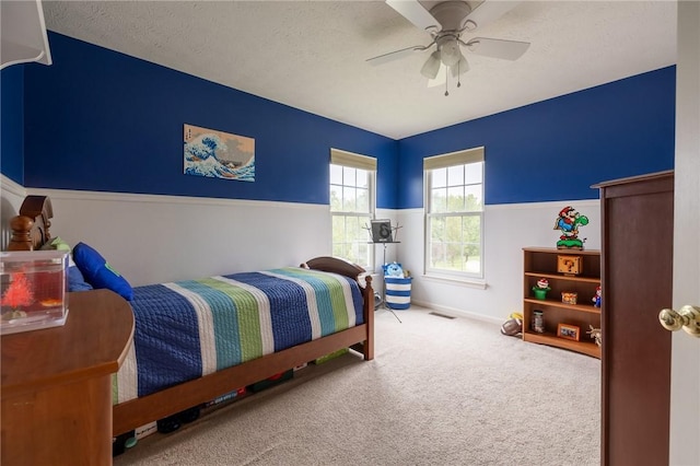 717 Westwood Trl, Walworth, NY 14502 - bedroom featuring carpet floors, ceiling fan, a textured ceiling, and baseboards