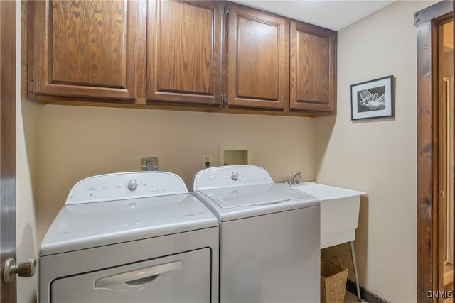 8807 Wandering Way, Lysander, NY 13027 - washroom featuring washing machine and dryer and cabinet space