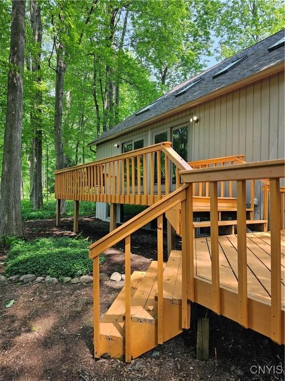 8807 Wandering Way, Lysander, NY 13027 - wooden terrace featuring stairway