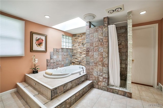 73 Stevenson Blvd, Amherst, NY 14226 - bathroom with a shower stall, a bath, a skylight, and tile patterned flooring