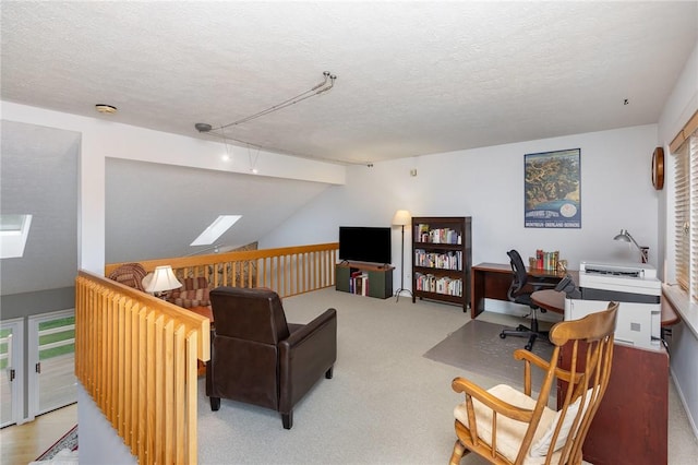 716 Mariner Cir, Webster, NY 14580 - living area with a desk, a textured ceiling, a skylight, and light carpet