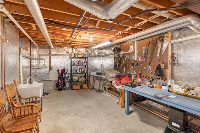 716 Mariner Cir, Webster, NY 14580 - unfinished below grade area with a workshop area