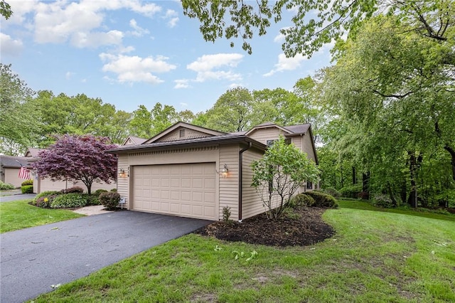 716 Mariner Cir, Webster, NY 14580 - view of side of home with a lawn, driveway, and a garage