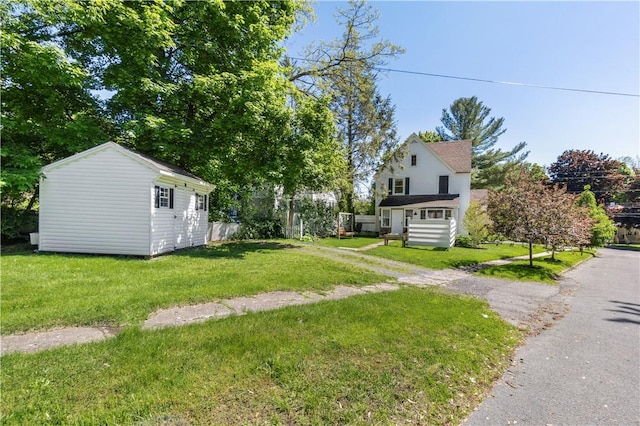 456 N Main St, Benton, NY 14527 - view of grassy yard with an outdoor structure
