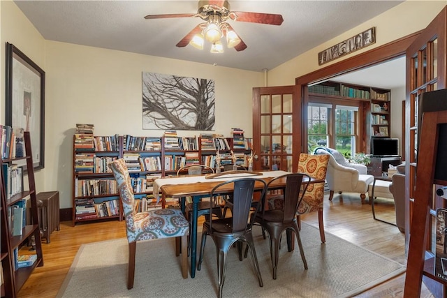 456 N Main St, Benton, NY 14527 - dining area with wood finished floors and ceiling fan