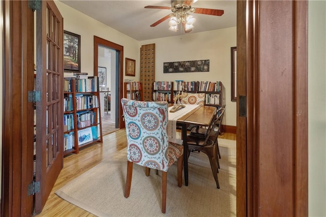 456 N Main St, Benton, NY 14527 - dining space with light wood-type flooring and a ceiling fan